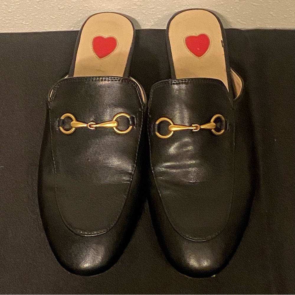 ARQA black mules w Gold Hardware